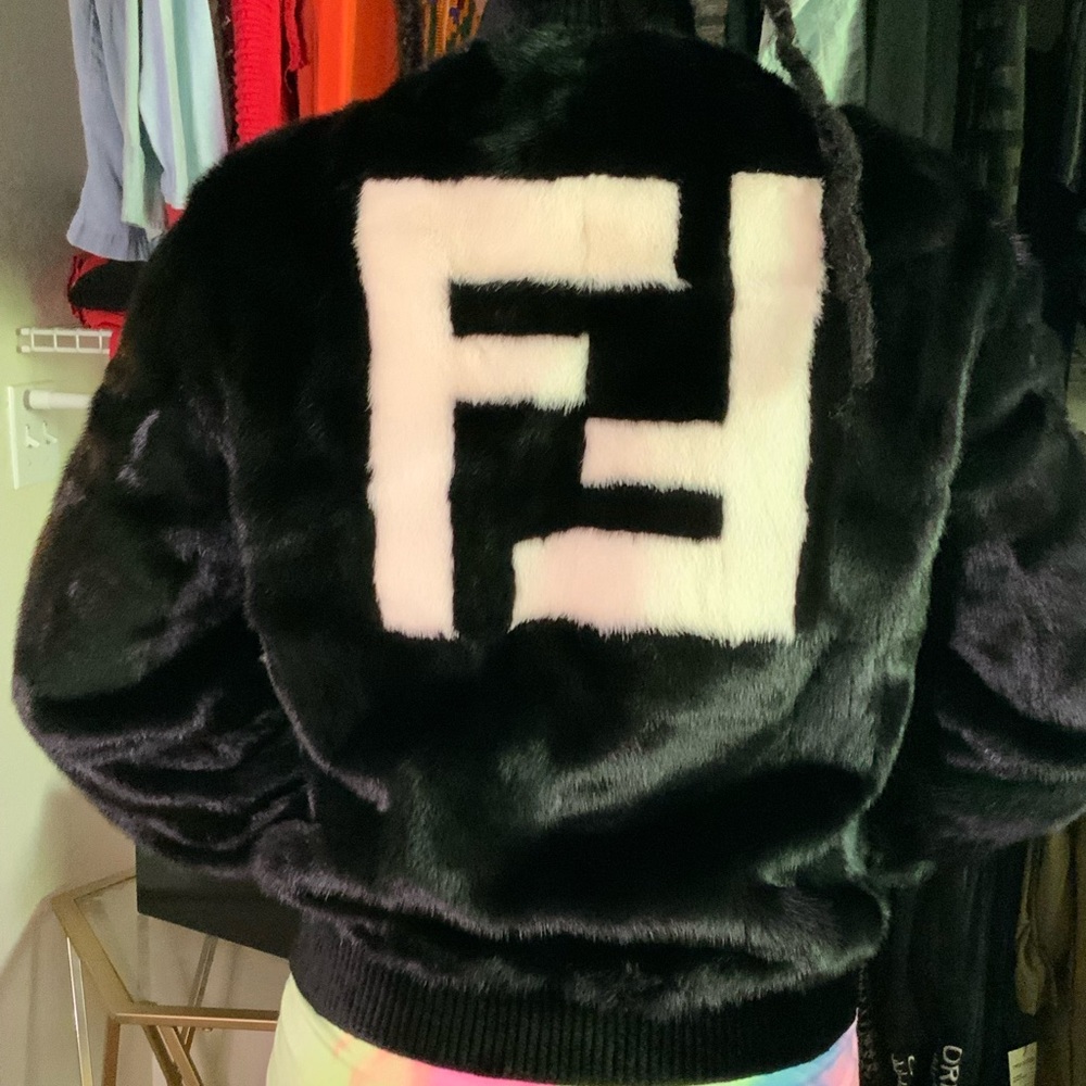 This is a Fendi Reversible Mink Fur/Lamb skin Jacket.